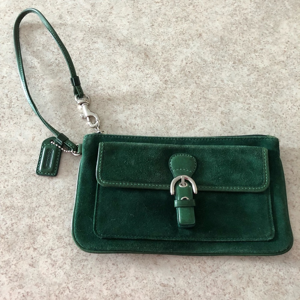 Never used. Coach suede wristlet